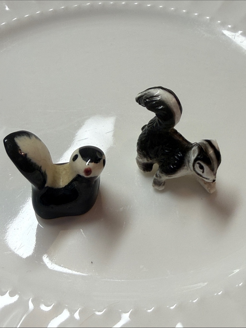 Vintage Miniature Ceramic Skunk Figurines